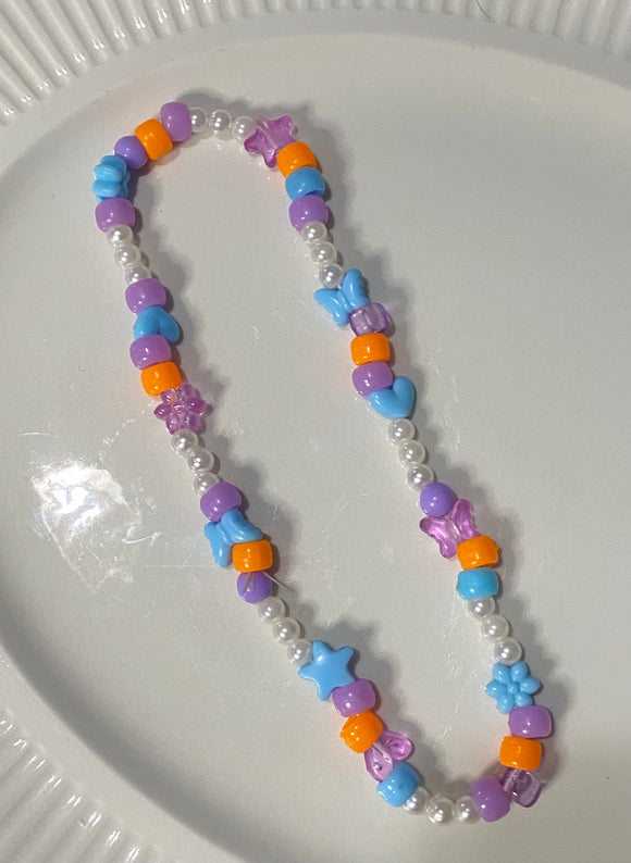 orange blue and purple beaded necklace with accent pearls