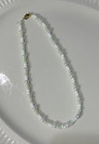 sage green and white beaded necklace with accent pearls